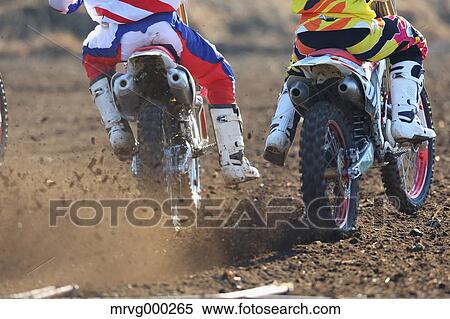 Motocross bikers on dirt track View Large Photo Image Stock Photography - Motocross bikers on dirt track. Fotosearch