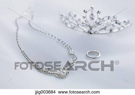 Necklace tiara and wedding ring View Large Photo Image Picture - Necklace tiara and wedding ring. Fotosearch