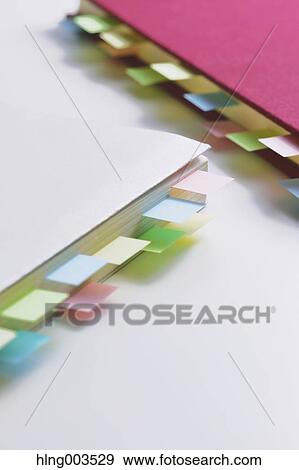 Post-it notes on a notebook View Large Photo Image Stock Photo - Post-it notes on a notebook. Fotosearch