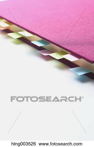 Post-it notes on a notebook View Large Photo Image Stock Photograph - Post-it notes on a notebook. Fotosearch