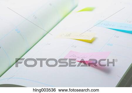 Post-it notes on a notebook View Large Photo Image Stock Photograph - Post-it notes on a notebook. Fotosearch