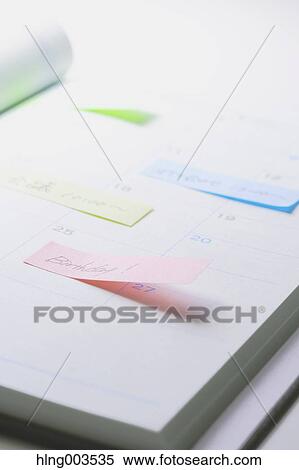 Post-it notes on a notebook View Large Photo Image Stock Photography - Post-it notes on a notebook. Fotosearch