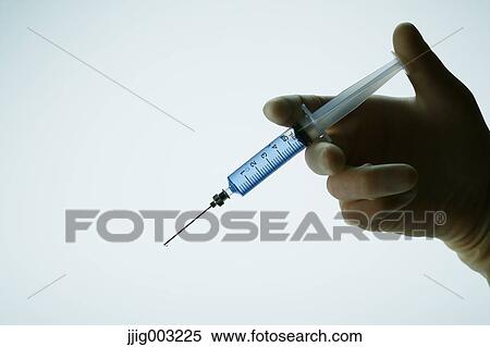 Stock Photography - Scientist working in the lab. Fotosearch