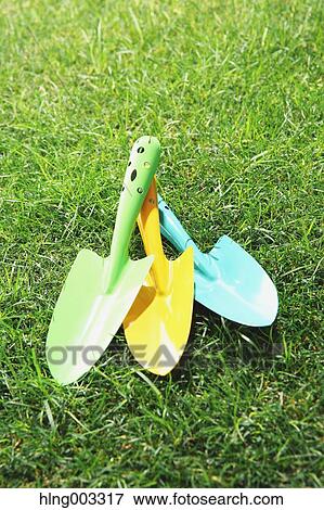Stock Photo - Scoops on grass. Fotosearch