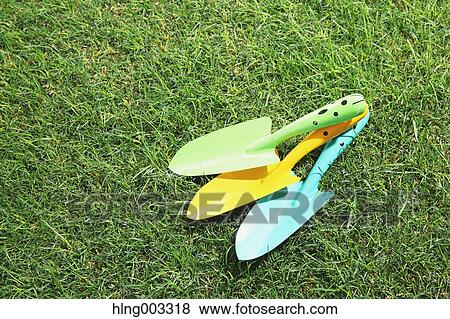 Stock Photo - Scoops on grass. Fotosearch