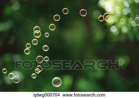 Soap bubbles and grass View Large Photo Image Picture - Soap bubbles and grass. Fotosearch