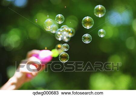 Soap bubbles and grass View Large Photo Image Stock Image - Soap bubbles and grass. Fotosearch