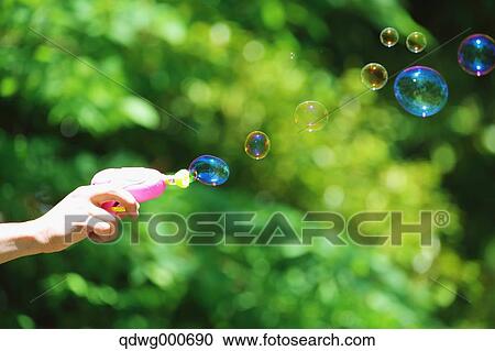 Soap bubbles and grass View Large Photo Image Stock Image - Soap bubbles and grass. Fotosearch