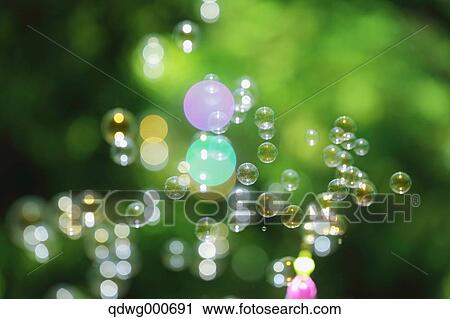 Soap bubbles and grass View Large Photo Image Stock Image - Soap bubbles and grass. Fotosearch