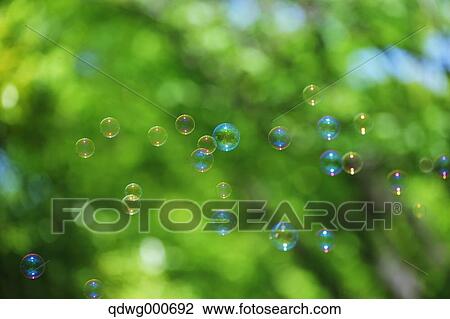 Soap bubbles and grass View Large Photo Image Stock Image - Soap bubbles and grass. Fotosearch