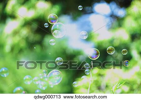 Soap bubbles and grass View Large Photo Image Stock Image - Soap bubbles and grass. Fotosearch