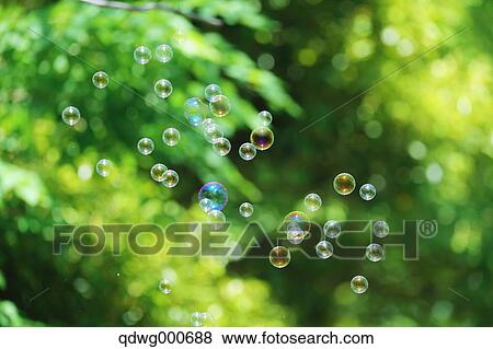 Soap bubbles and grass View Large Photo Image Stock Photo - Soap bubbles and grass. Fotosearch