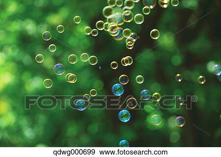 Soap bubbles and grass View Large Photo Image Stock Photo - Soap bubbles and grass. Fotosearch