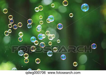 Soap bubbles and grass View Large Photo Image Stock Photograph - Soap bubbles and grass. Fotosearch