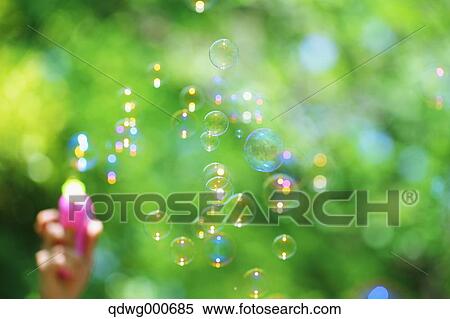 Soap bubbles and grass View Large Photo Image Stock Photography - Soap bubbles and grass. Fotosearch