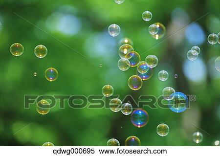 Soap bubbles and grass View Large Photo Image Stock Photography - Soap bubbles and grass. Fotosearch