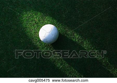 Soccer ball on grass View Large Photo Image Stock Photography - Soccer ball on grass. Fotosearch