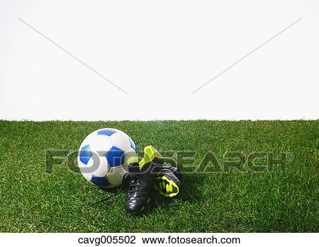 Stock Image - Soccer equipment on grass. Fotosearch