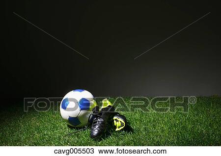 Stock Image - Soccer equipment on grass. Fotosearch