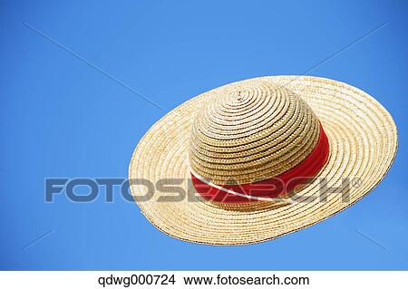 Straw hat flying in the sky View Large Photo Image Picture - Straw hat flying in the sky. Fotosearch