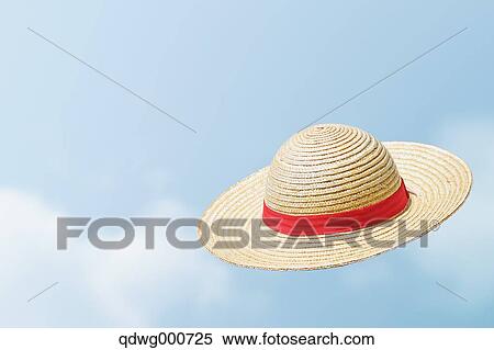Straw hat flying in the sky View Large Photo Image Stock Photography - Straw hat flying in the sky. Fotosearch