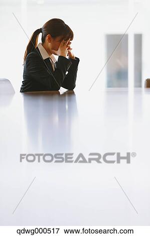 Tired Japanese businesswoman View Large Photo Image Stock Photo - Tired Japanese businesswoman. Fotosearch