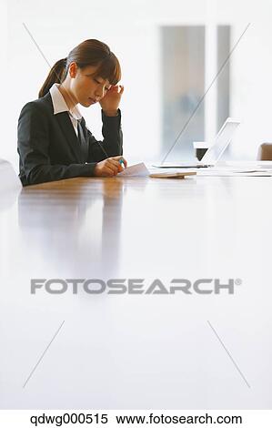 Tired Japanese businesswoman View Large Photo Image Stock Photography - Tired Japanese businesswoman. Fotosearch
