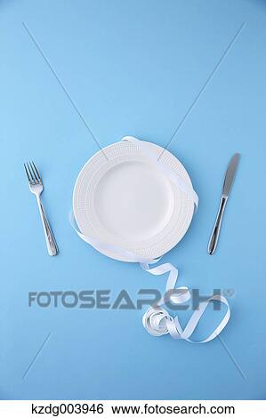 Stock Photograph - White plate. Fotosearch