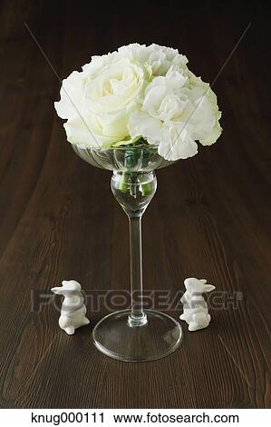 White roses in a glass View Large Photo Image Stock Image - White roses in a glass. Fotosearch
