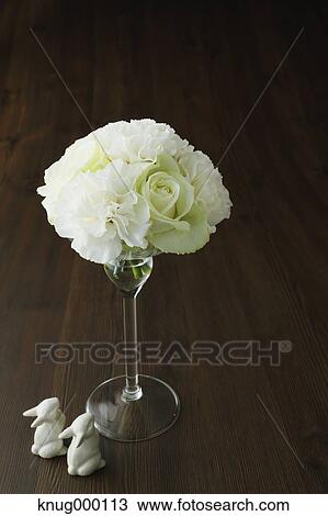 White roses in a glass View Large Photo Image Stock Image - White roses in a glass. Fotosearch