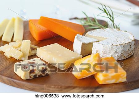 Assorted cheese View Large Photo Image Stock Photo - Assorted cheese. Fotosearch