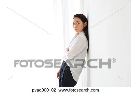 Attractive Japanese woman in a airy room View Large Photo Image Stock Image - Attractive Japanese woman in a airy room. Fotosearch