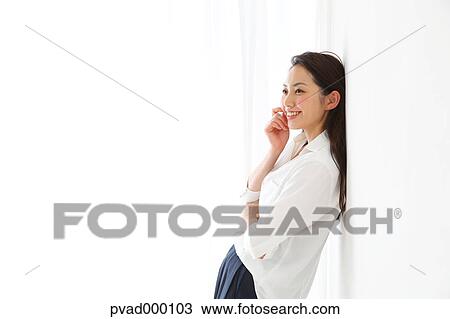 Attractive Japanese woman in a airy room View Large Photo Image Stock Image - Attractive Japanese woman in a airy room. Fotosearch