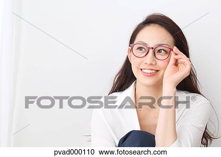 Attractive Japanese woman in a airy room View Large Photo Image Stock Image - Attractive Japanese woman in a airy room. Fotosearch