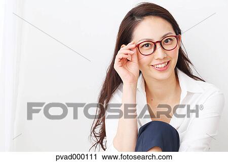 Attractive Japanese woman in a airy room View Large Photo Image Stock Image - Attractive Japanese woman in a airy room. Fotosearch