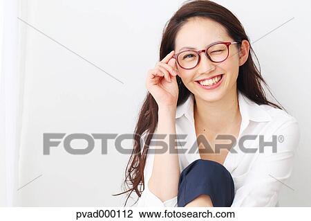 Attractive Japanese woman in a airy room View Large Photo Image Stock Image - Attractive Japanese woman in a airy room. Fotosearch