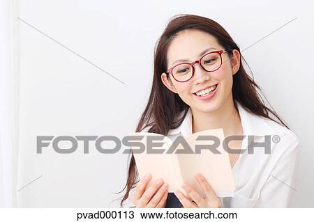 Attractive Japanese woman in a airy room View Large Photo Image Stock Image - Attractive Japanese woman in a airy room. Fotosearch