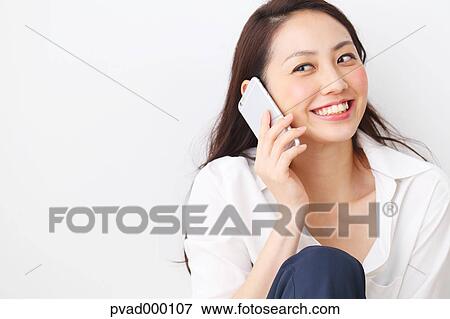 Attractive Japanese woman in a airy room View Large Photo Image Stock Photo - Attractive Japanese woman in a airy room. Fotosearch