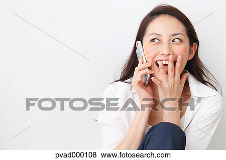 Attractive Japanese woman in a airy room View Large Photo Image Stock Photo - Attractive Japanese woman in a airy room. Fotosearch
