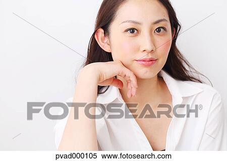 Attractive Japanese woman in a airy room View Large Photo Image Stock Photography - Attractive Japanese woman in a airy room. Fotosearch