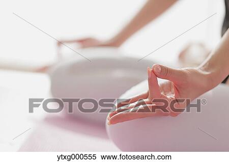 Attractive young Japanese practicing yoga in an airy room View Large Photo Image Stock Photography - Attractive young Japanese practicing yoga in an airy room. Fotosearch