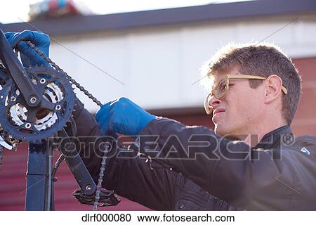 Bicycle taxi driver fixing his vehicle, Salt Like City, USA View Large Photo Image Stock Image - Bicycle taxi driver fixing his vehicle, Salt Like City, USA. Fotosearch