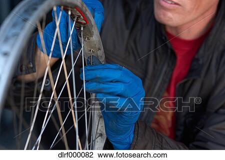 Bicycle taxi driver fixing his vehicle, Salt Like City, USA View Large Photo Image Stock Image - Bicycle taxi driver fixing his vehicle, Salt Like City, USA. Fotosearch