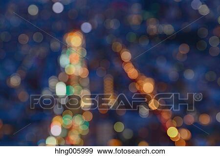 Blurred view of cityscape at night View Large Photo Image Stock Photo - Blurred view of cityscape at night. Fotosearch