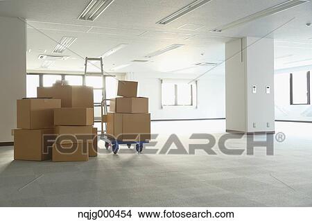 Boxes in an empty office View Large Photo Image Picture - Boxes in an empty office. Fotosearch
