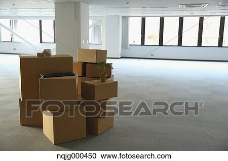 Boxes in an empty office View Large Photo Image Stock Image - Boxes in an empty office. Fotosearch