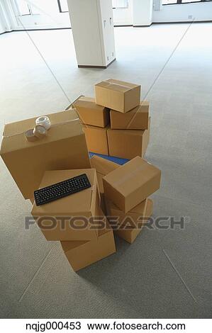 Boxes in an empty office View Large Photo Image Stock Image - Boxes in an empty office. Fotosearch