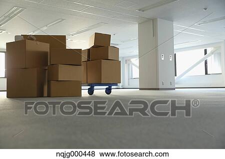 Stock Photo - Boxes in an empty office. Fotosearch