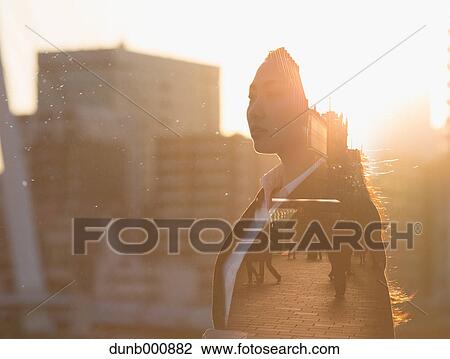Double exposure of young woman and cityscape View Large Photo Image Stock Image - Double exposure of young woman and cityscape. Fotosearch