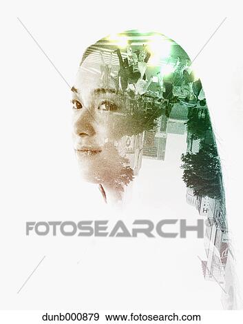 Stock Photo - Double exposure of young woman and cityscape. Fotosearch
